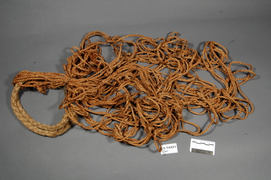 Hearst Museum object titled Carrying net, accession number 1-14421, described as Carrying net of red milkwood fiber in good condition. One loop of hemp, the other loop and strap missing.