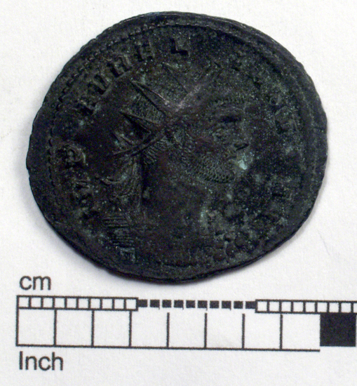 Hearst Museum object 1 of 8 titled Coin: billon antoninianus, accession number 8-4067, described as Coin; Billon; Antoninianus; Roman. 4.30 grams, 26 mm. Aurelian, 270-275 AD. Rome, Italy. Obverse: IMP C AVRELIANVS, Bust r. radiate. Reverse: ORIENS AVG, Sol l., between two captives, in exergue P M