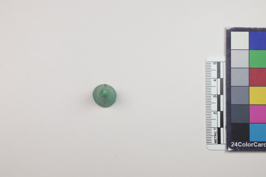 Hearst Museum object titled Game piece, accession number 6-19630, described as blue glaze cone, small. Game pieces