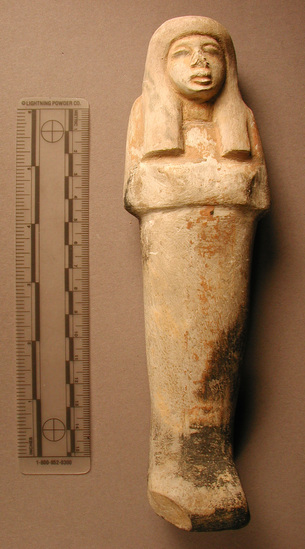 Hearst Museum object titled Mummiform figurine, accession number 6-8494, described as Limestone shabti in the form of a mummy. Traces of black, red, and yellow paint.