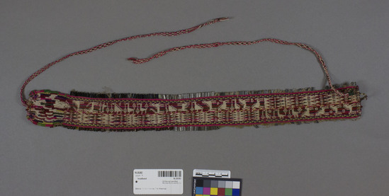 Hearst Museum object titled Headband, accession number 16-20282, described as Headband; 132 x 7 cn overall; woven band 47 x 5,5 cn ; ties 38 abd 44 cn; beads .5 cm ;warp faced doublte weave with birds, horses and hooked geometric figures. wrapped warp ends; narrow crossed warp 3 color ties sewn to band at each end.  beads along both selvedges of band; multicolor stripe warp, natural light tan warp. black clear and bronze color beads.