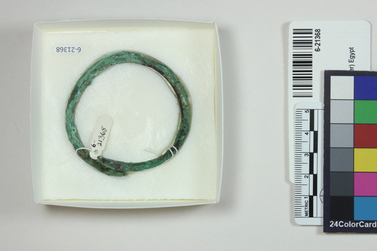 Hearst Museum object titled Bracelet, accession number 6-21368, described as Bronze bracelet. Ptolemaic. Notice: Image restricted due to its potentially sensitive nature. Contact Museum to request access.