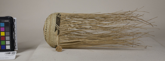 Hearst Museum object 2 of 3 titled Cap, accession number 1-214032, described as Unfinished basketry cap. Plain twined, except for start and single row defining design zone. Single faced overlay. White grass (Xerophyllum tenax) and maidenhair fern.