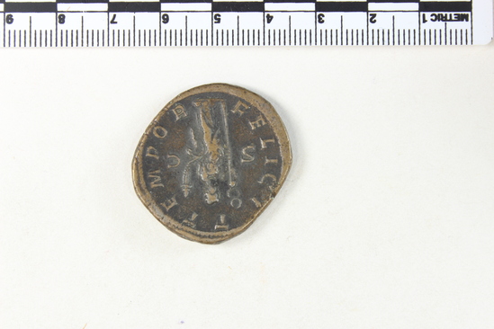 Hearst Museum object 7 of 8 titled Coin: æ sestertius, accession number 8-5921, described as Coin: Sestertius; Æ; Gordianus.Pius - 17.17 grams. Rome, 240-244 AD. Obverse: IMP GORDIANVS PIVS FEL AVG - bust facing right, laureate, draped, cuirassed. Reverse: FELICI T TEMPOR, SC - Felicitas standing holding long caduceus and cornucopiae.