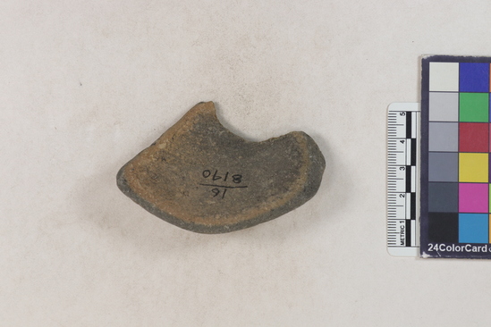 Hearst Museum object titled Potsherd, accession number 16-8140, described as Potsherd; base Numbers  8111 to 8194 are sherds picked up on beach at low tide. Section of Manta on Beach currently inhabited.