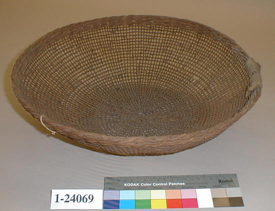 Hearst Museum object titled Basket, accession number 1-24069, described as Openwork basket.  3 heavy twisted bands around rim, supported by cotton string.