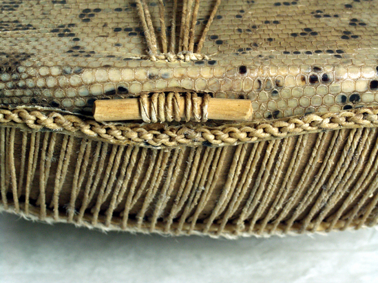 Hearst Museum object 3 of 9 titled Lyre, accession number 5-6641, described as bowl lyre; traditional lyre shape; top and side pieces straight solid cylindrical sticks; wood sound box with sound table of reptile skin; back covered with goat hide; skin lacing; 1 sound hole; 8 twisted gut strings.