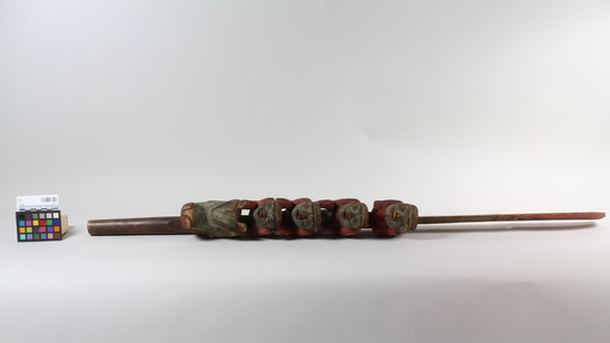 Hearst Museum object titled Wand, accession number 2-4775, described as With carvings of 4 men and a bear's head.