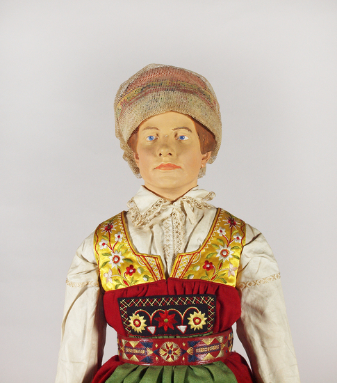 Hearst Museum object 4 of 4 titled Doll with costume, accession number 7-411a,b, described as Female doll showing peasant’s costume of Österåkers socken, Södermanland, Sweden, Northern Europe.