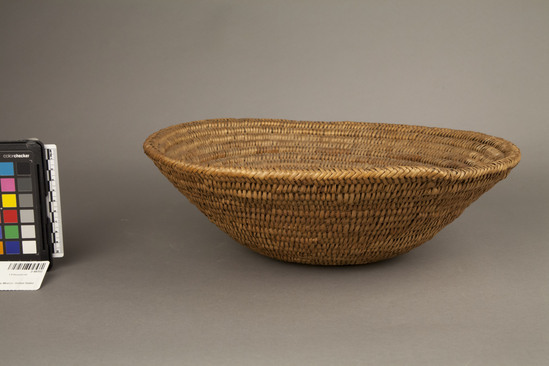 Hearst Museum object 1 of 2 titled Basket, accession number 2-48352, described as Coiled, basin shaped; thick 3 rod foundation of whole shoots; faded brown designs and light ground in split shoot sewing strands.