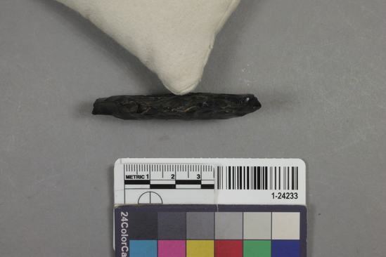 Hearst Museum object 3 of 4 titled Knife, accession number 1-24233, described as obsidian knife fragment 65 mm. long