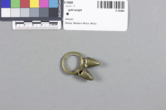 Hearst Museum object 2 of 2 titled Gold weight, accession number 5-16484, described as Gold weight: ring with two beehive-like "stones."  Used for weighing gold dust.