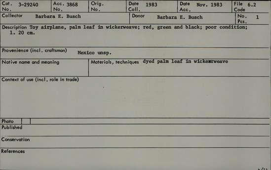 Documentation associated with Hearst Museum object titled Toy airplane, accession number 3-29240, described as Toy airplane, palm leaf in wickerweave; red, green and black; poor condition; L 20 cm.