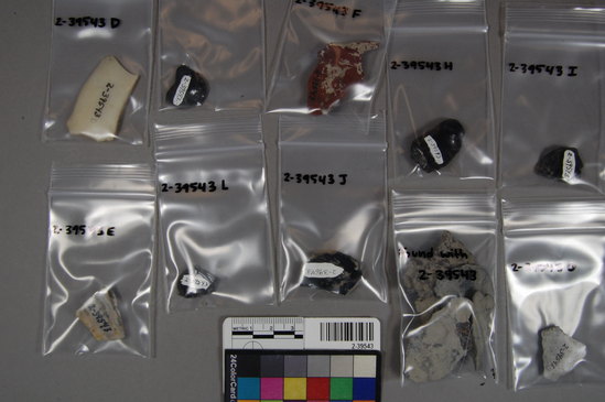 Hearst Museum object titled Flake, accession number 2-39543, described as Stone chips: obsidian, white chalcedony, jasper, basalt, agate (?)