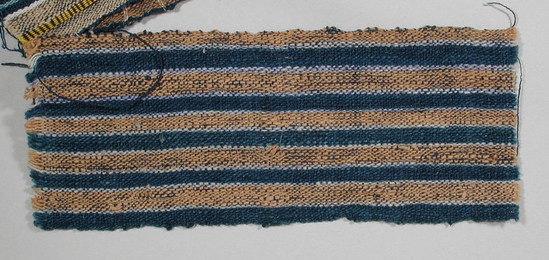 Hearst Museum object titled Textile fragment, accession number 5-11059, described as Textile sample (section of narrow band weaving): Alternating stripes of reddish-tan and royal dark blue, separated by narrow stripes of bluish white.