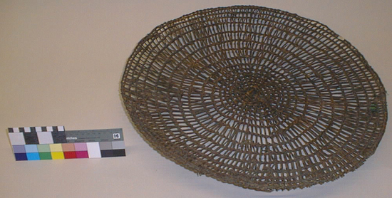 Hearst Museum object titled Plate basket, accession number 1-11667, described as Plate basket; twined. Warp and weft are Hazel (Corylus cornuta californica). Grimy from use. Plain twined.