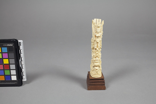 Hearst Museum object titled Figurine, accession number 18-263, described as Ivory carving of “Sita” riding on “Garuda;” carved wood base. Sita is Rama’s wife. Height 6 1/2 inches.
