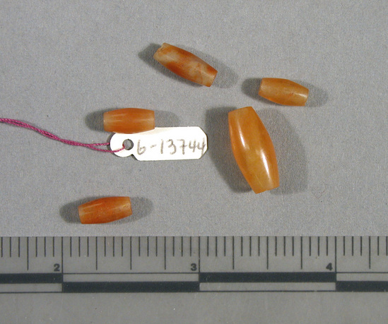 Hearst Museum object titled Beads, accession number 6-13744, described as Beads: 5 carnelian barrel-shaped.