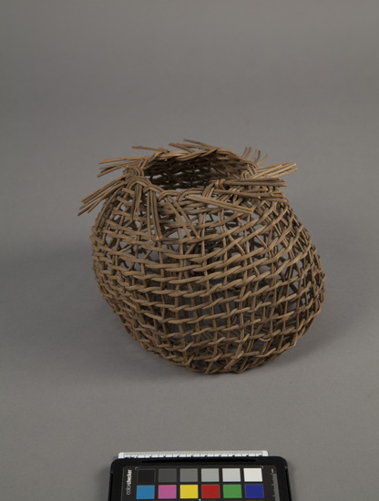 Hearst Museum object titled Mākālei (fish trap), accession number 11-1421, described as Small, globular with top turned in to prevent exit of fish. Part of McLeod Memorial Collection.