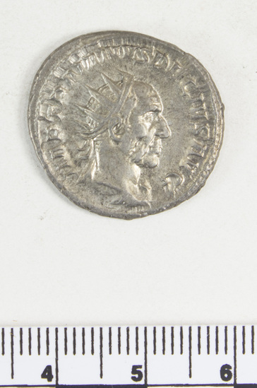Hearst Museum object 4 of 8 titled Coin: ar antoninianus, accession number 8-4370, described as Coin; Billon; Antoninianus; Roman. 4.22 grams, 23 mm. Trajan Decius, 249-251 AD. Obverse: IMP TRAIANV DECIVS AVG, bust r. radiate. Reverse: GENIVS EXERCITVS ILLVRICIANI, genius standing l., military standard at r.