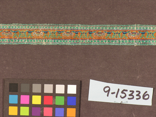 Hearst Museum object titled Ribbon, accession number 9-15336, described as Ribbon. Silk, metal wrapped yarns. Brocaded. Varicolored. ⅞ inch by 65 inches.